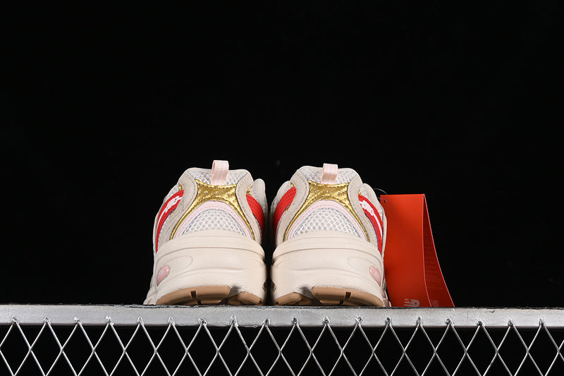 NEW BALANCE 530 FESTIVAL PACK CREAM/PINK/RED